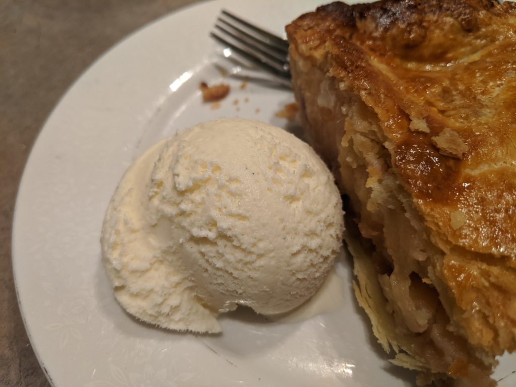 Apple and quince pie with vanilla ice cream